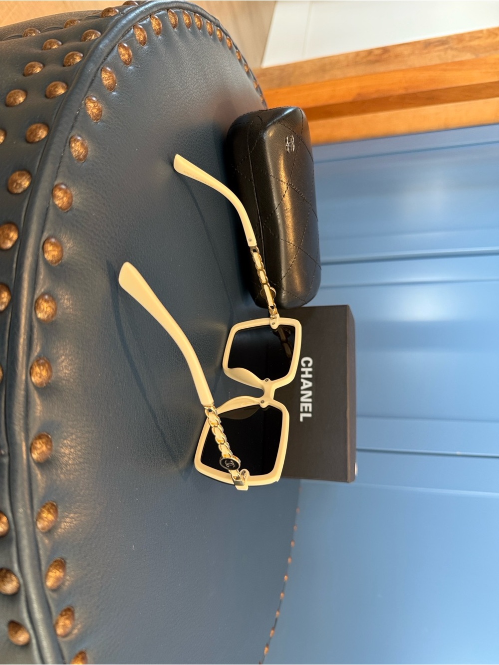 CHANEL Cream Square Sunglasses with Gold Chain Detail and Black Lenses